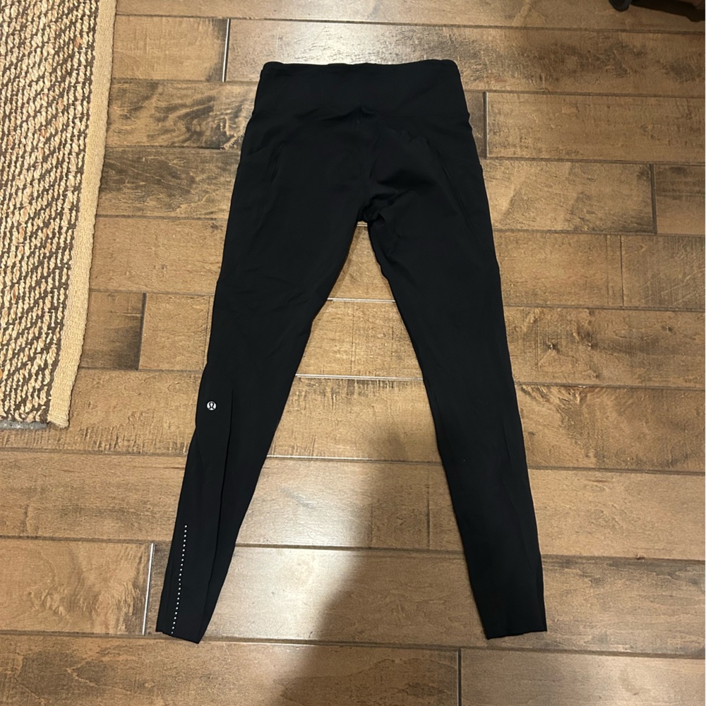 Black High-Waisted Leggings Lululemon Fast Free 7/8 leggings. Size 8.